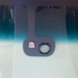 PARABREZZA VERDE INCAPSULATO C/FASCIA+SENSORE PER NISSAN NAVARA/PATHFINDER 01/2005>